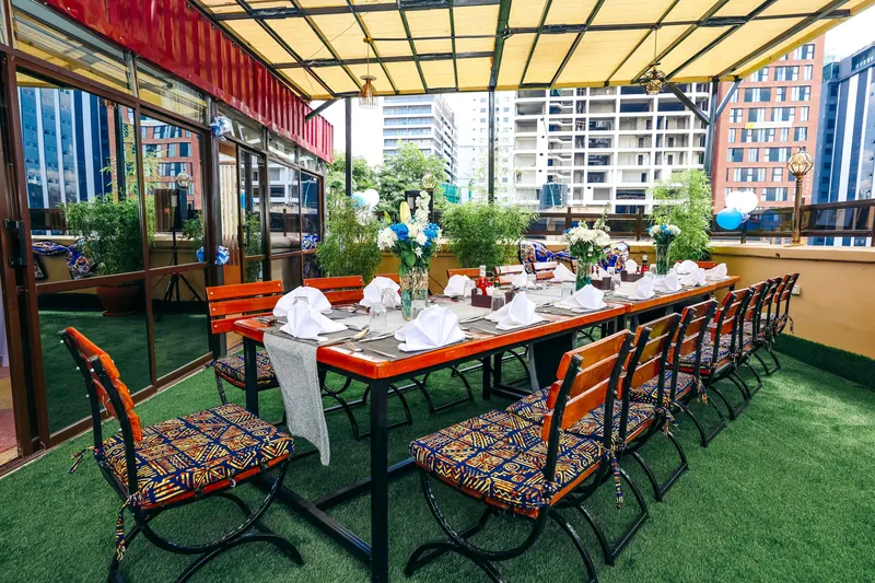 Rooftop dining table with skyline views