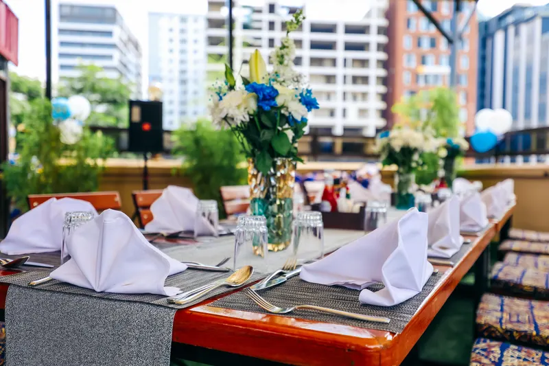 Rooftop table close-up with flowers